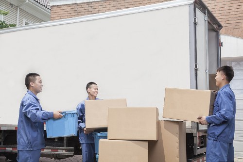 Flat removals in Acton with moving van outside apartment building