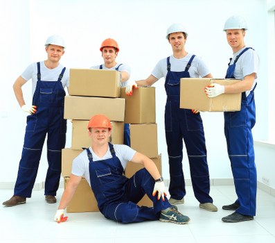 Removal team preparing a property for moving day in Acton