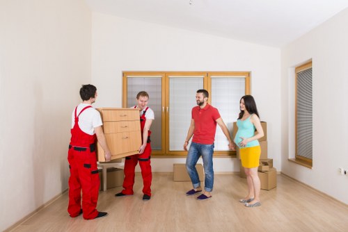 Office removals planning in Acton with moving boxes and desks