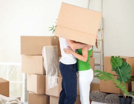 Packed apartment moving boxes ready for flat removals in Acton