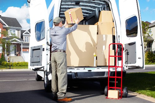Packed office supplies and labels for an Acton business relocation