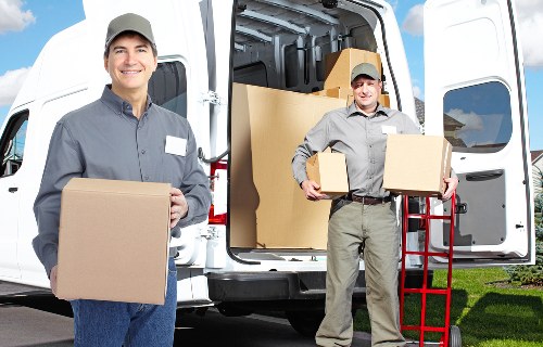 Local Acton movers handling boxes and household items