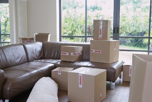 A family preparing belongings for home moving day in Acton
